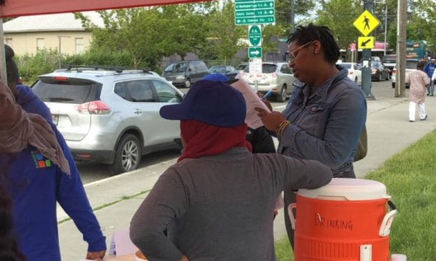 Rainier Beach Light Rail Station Corner Greeter, May 2019